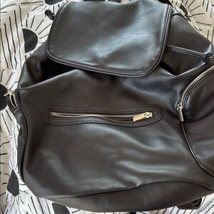 Sleek Black Backpack with Modern Design